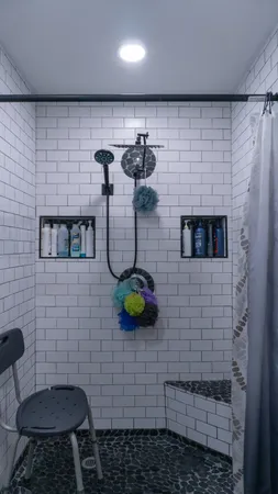 a view of a dining room with furniture and chandelier fan