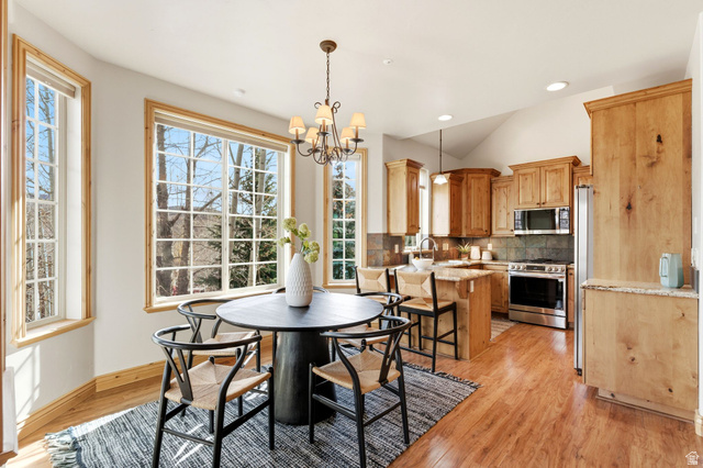 3026 Lower Saddleback Road Park City, UT 84098 - Photo 9 of 71 Dining room with a chandelier, light wood-type flooring, recessed lighting, and vaulted ceiling