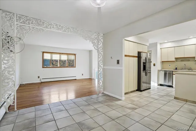 a front view of a house with a wooden fence