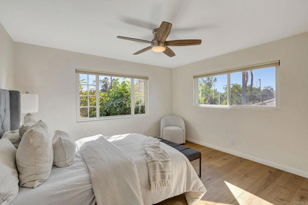 732 Osborne Street Vista, CA 92084 - Photo 21 of 44 a bedroom with a bed and a window
