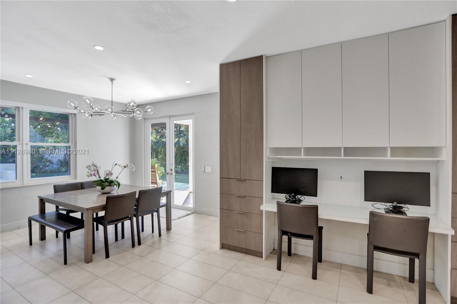 1078 Briar Ridge Road Weston, FL 33327 - Photo 19 of 41 a view of a dining room with furniture and window