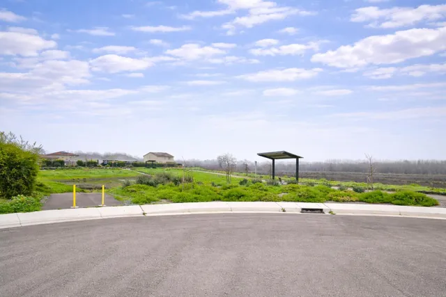 a view of a street with a houses