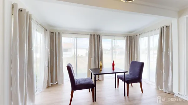 a view of a livingroom with furniture window and outside view