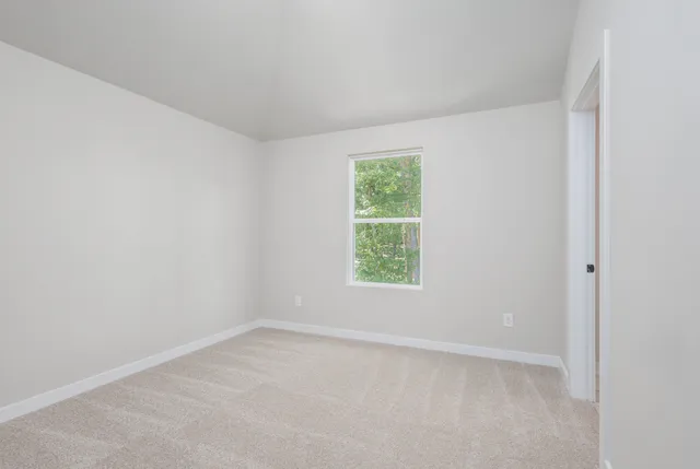 an empty room with a window