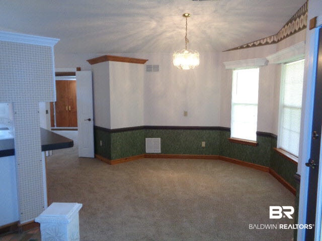 28202 Vargo Lane Elberta, AL 36530 - Photo 5 of 45 11 x 11. Carpet new April 2016. Chandelier. Chair rail. View from living room.