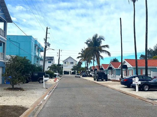 a view of the street with cars