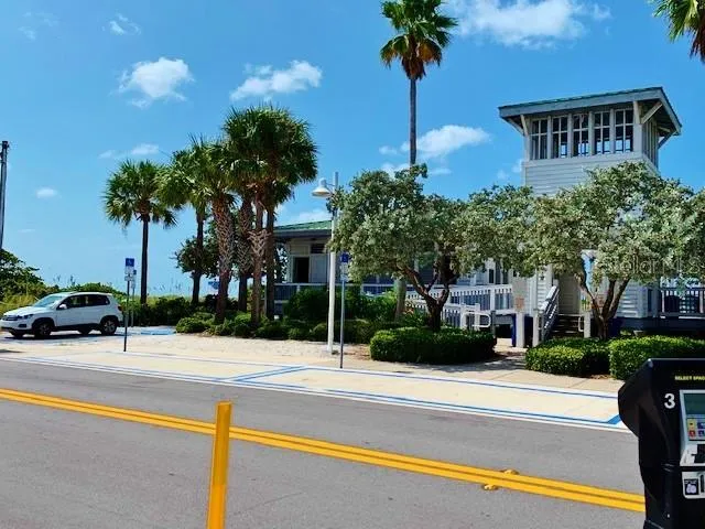 a view of a street with houses on the side
