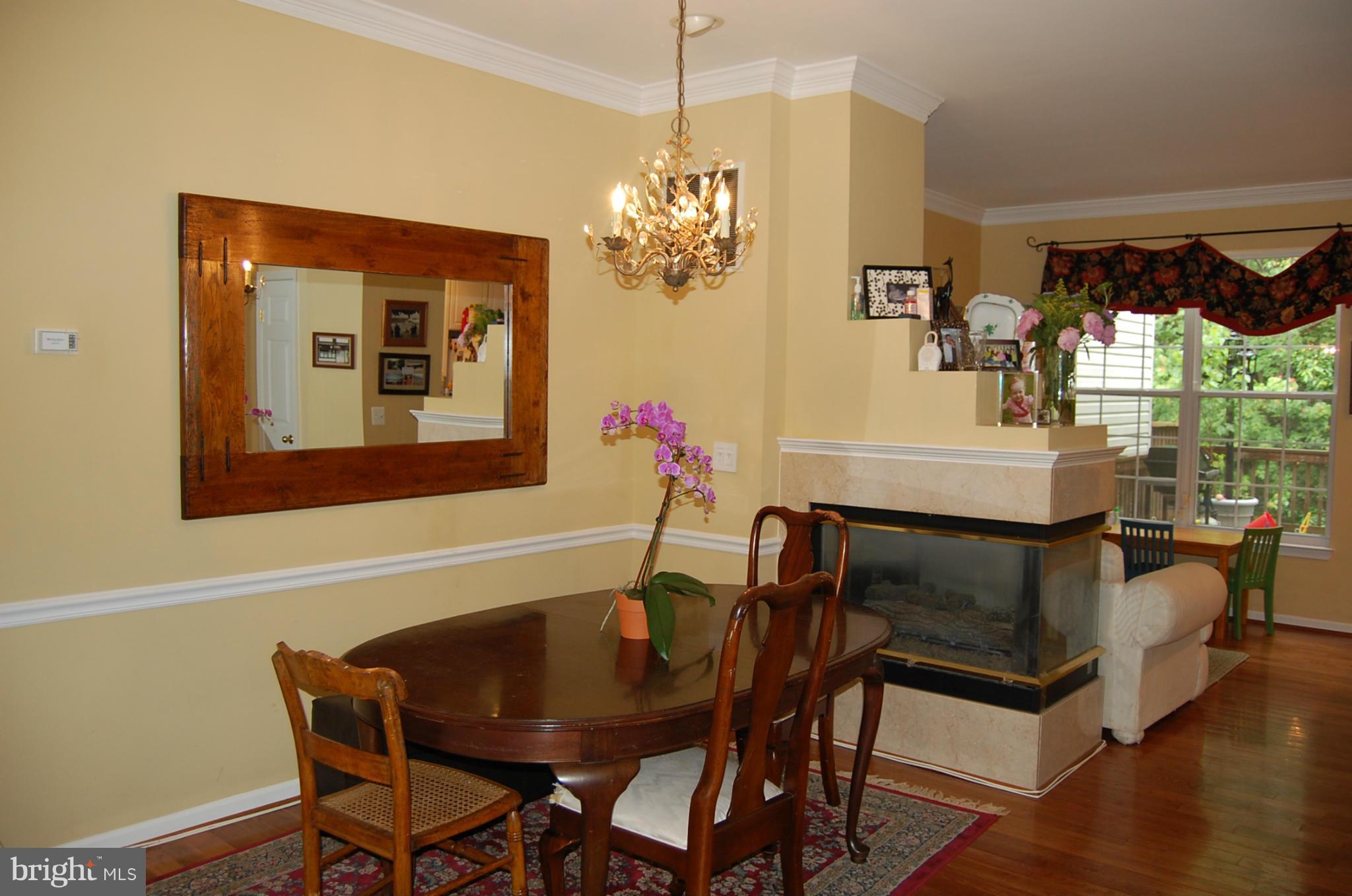 1211 Wild Hawthorn Way Reston, VA 20194 - Photo 7 of 12 Dining Room hardwood & Gas fireplae
