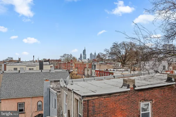 a view of residential houses with city view