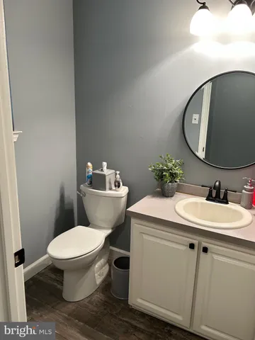 a bedroom with a bed and lamp with window