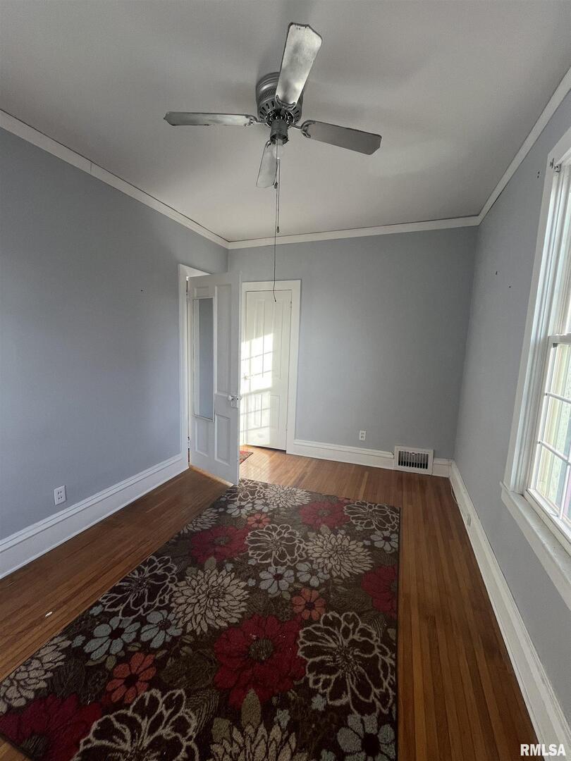 328 East Prospect Street Kewanee, IL 61443 - Photo 25 of 41 a view of room with window and ceiling fan