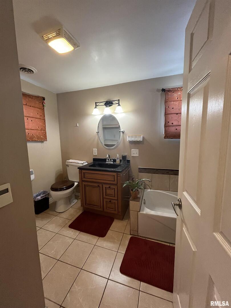 328 East Prospect Street Kewanee, IL 61443 - Photo 26 of 41 a kitchen with a sink and a stove top oven