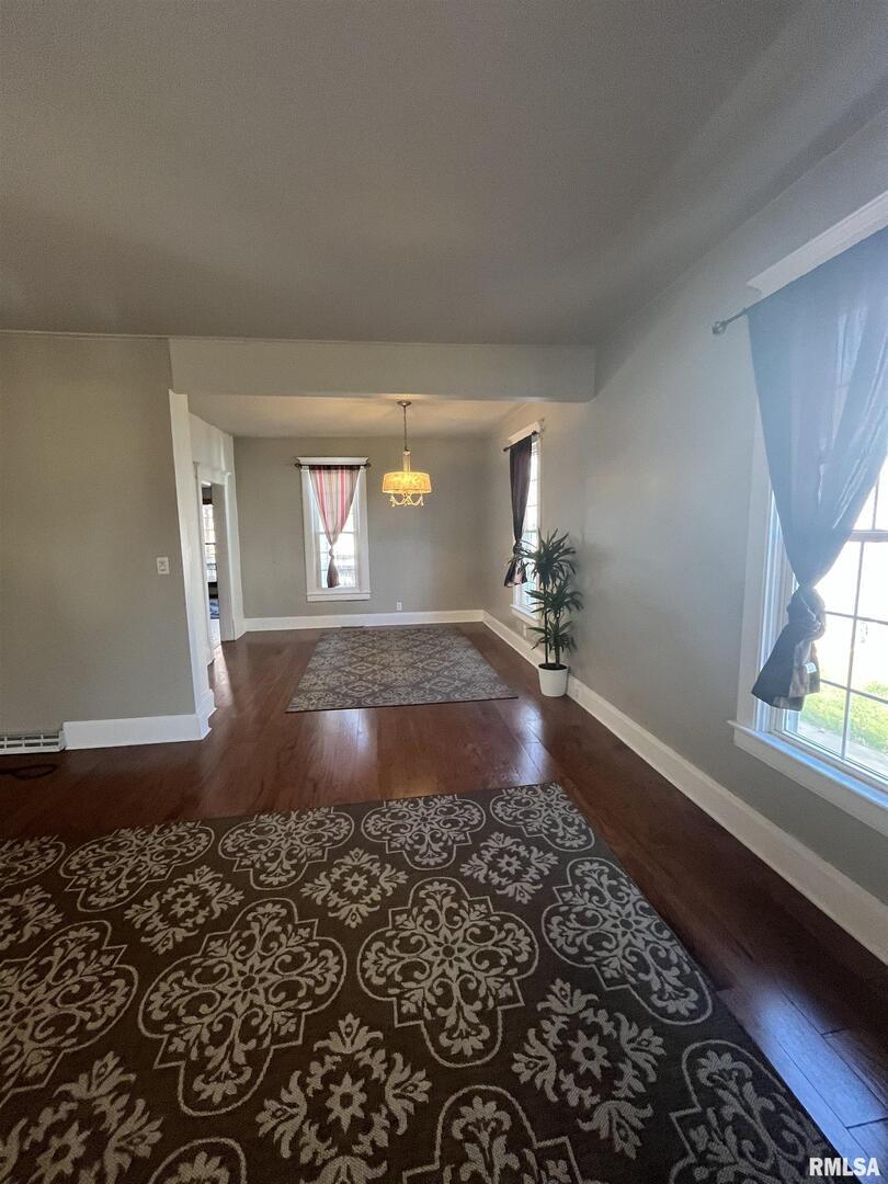 328 East Prospect Street Kewanee, IL 61443 - Photo 9 of 41 a view of entryway and hall with wooden floor