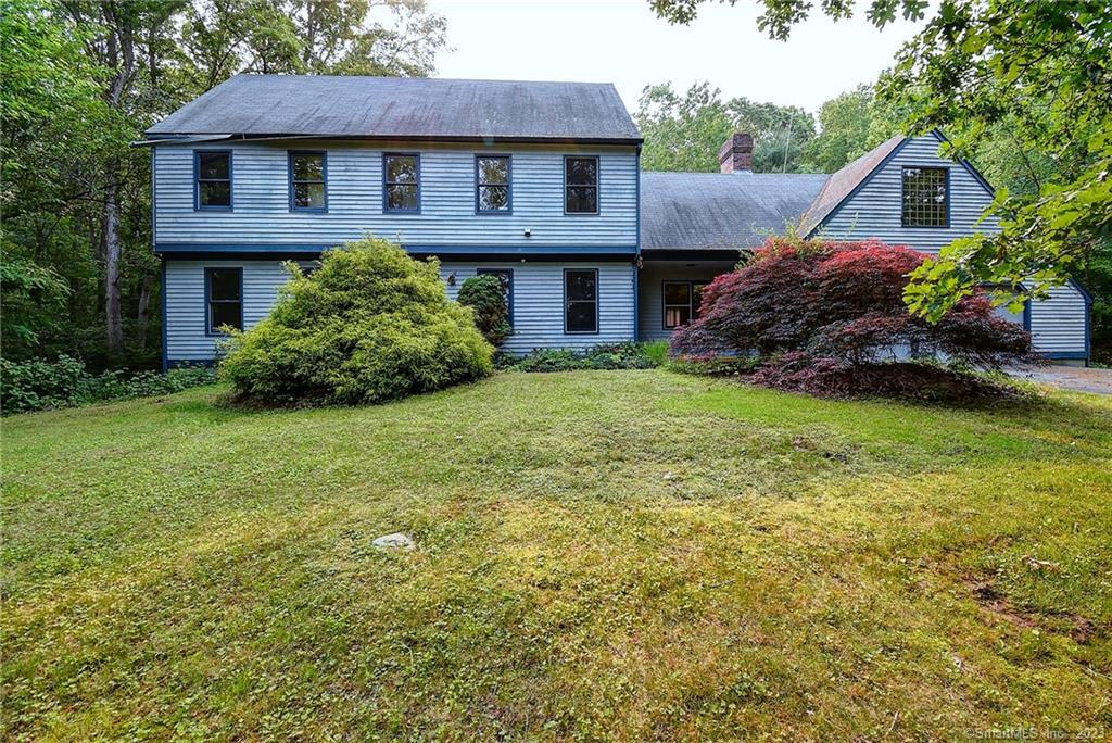 110 Fishing Brook Road Westbrook, CT 06498 - Photo 1 of 1 a view of a house with a yard and plants