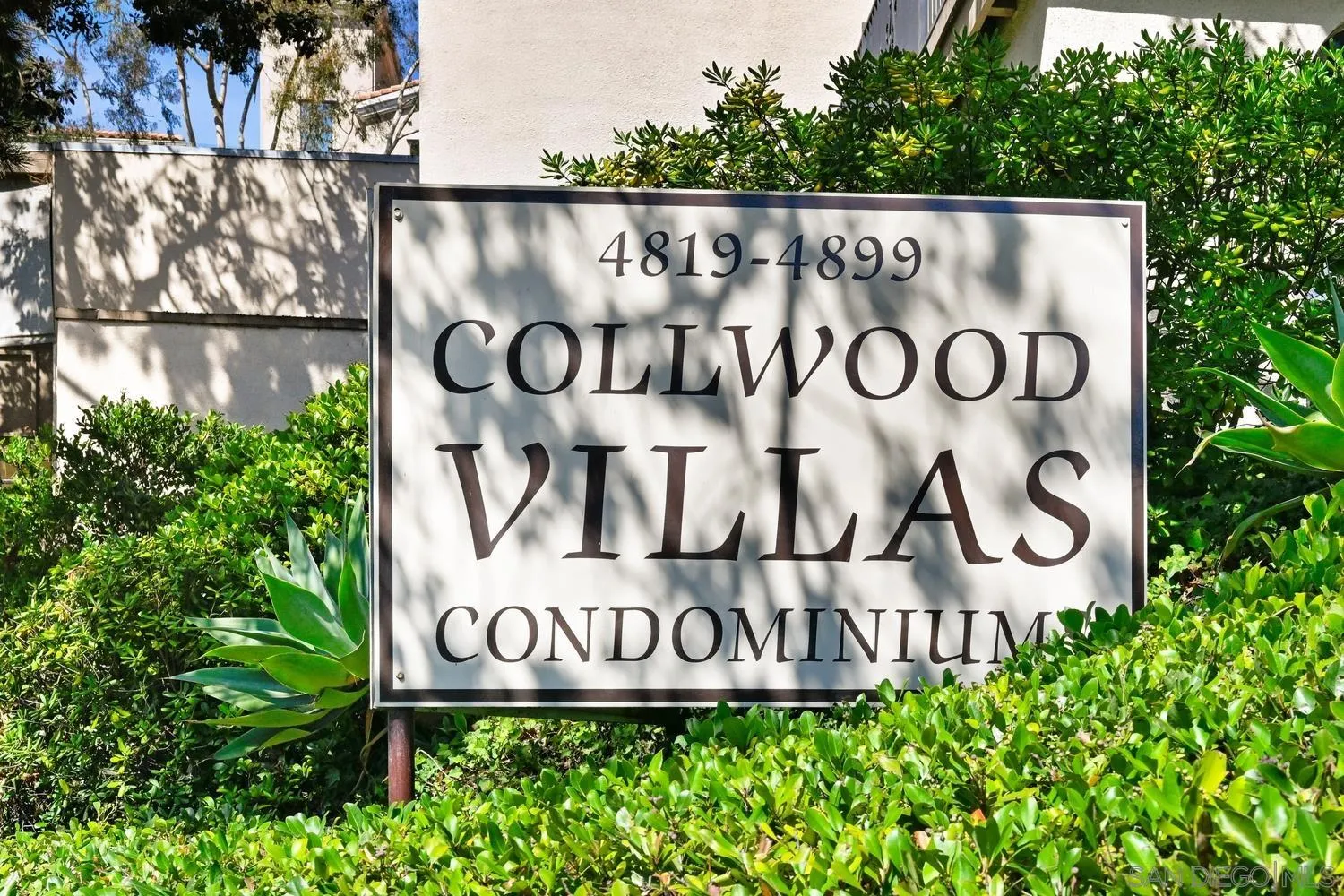 4881 Collwood Boulevard, Unit A San Diego, CA 92115 - Photo 21 of 25 a sign on the side of a building