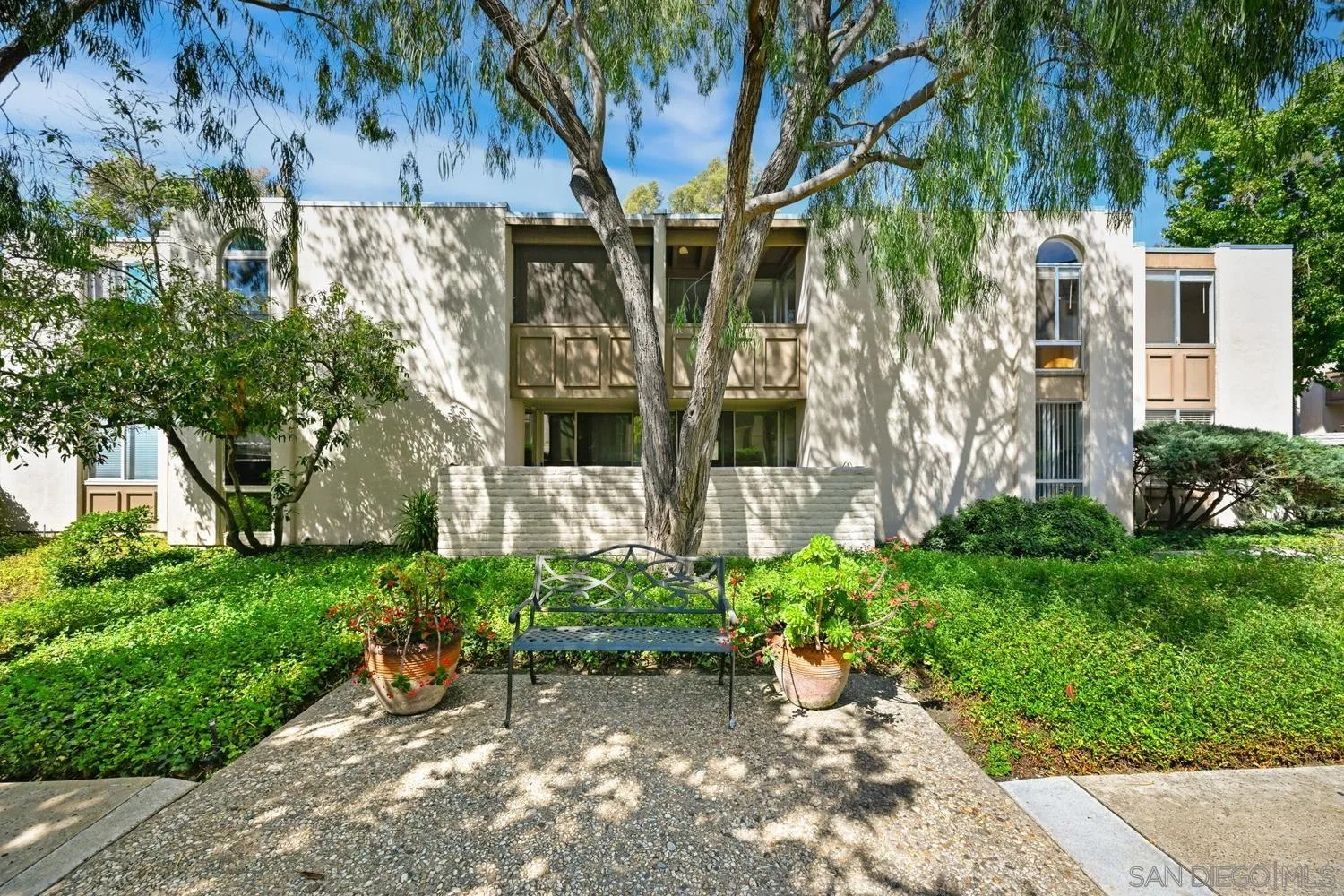 4881 Collwood Boulevard, Unit A San Diego, CA 92115 - Photo 23 of 25 a view of a back yard of the house