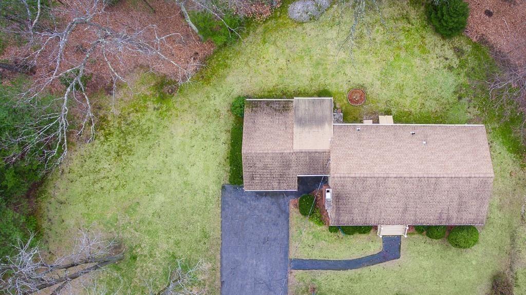10 Kelch Road Reading, MA 01867 - Photo 5 of 16 an aerial view of a house with a yard and a large tree