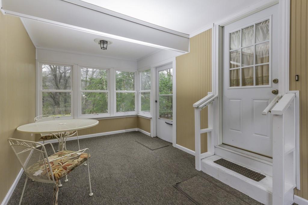 10 Kelch Road Reading, MA 01867 - Photo 6 of 16 a view of a room with furniture and windows
