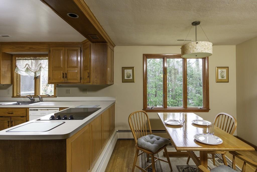 10 Kelch Road Reading, MA 01867 - Photo 8 of 16 a dining room with furniture and window