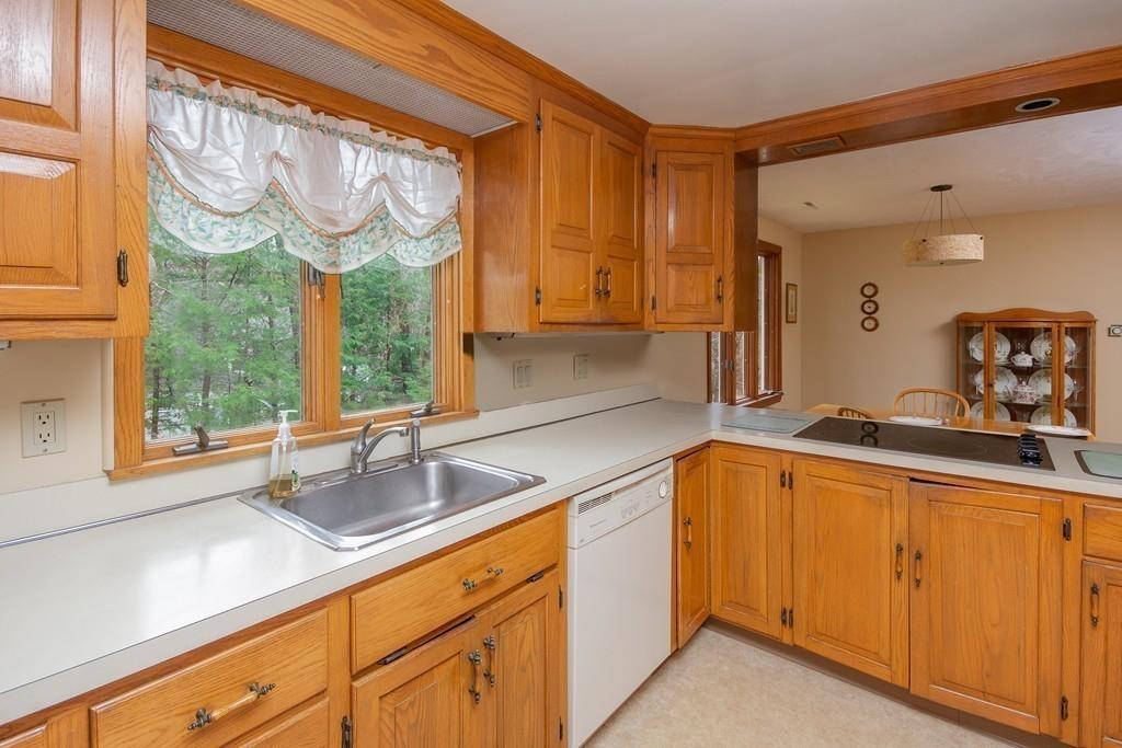 10 Kelch Road Reading, MA 01867 - Photo 9 of 16 a kitchen with a sink and a large window