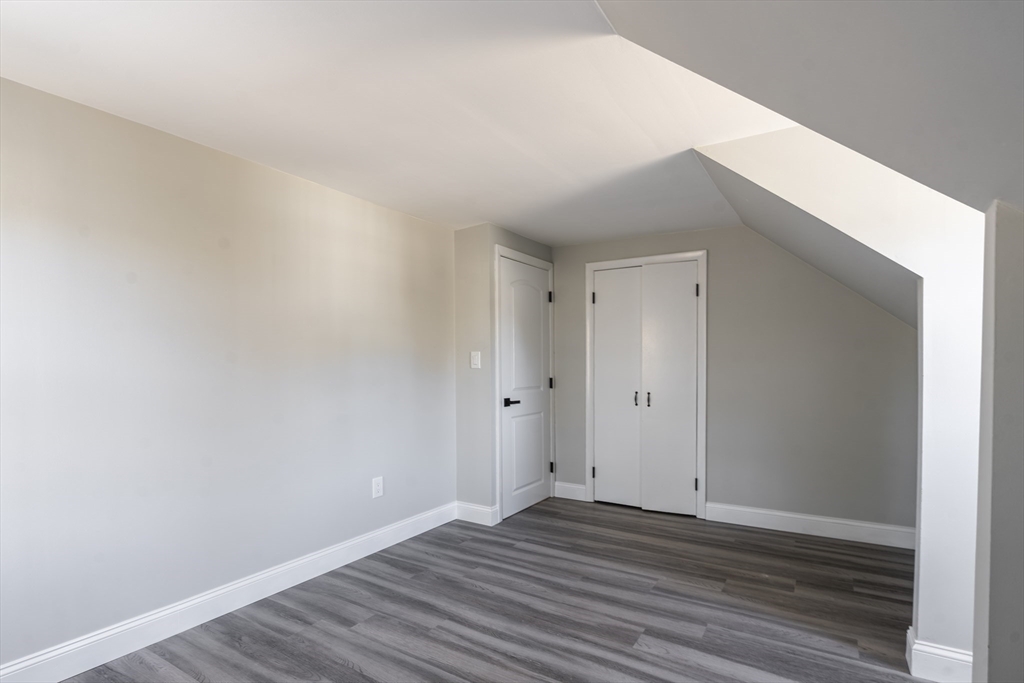 1049 Pleasant Street Canton, MA 02021 - Photo 24 of 34 a view of a room with wooden floor