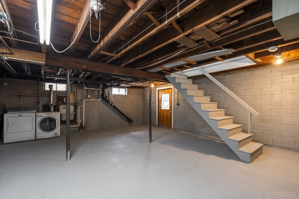 1049 Pleasant Street Canton, MA 02021 - Photo 25 of 34 a view of an empty room with stairs