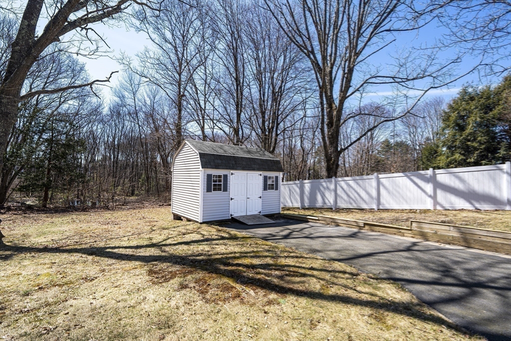 1049 Pleasant Street Canton, MA 02021 - Photo 32 of 34 a view of a backyard of the house