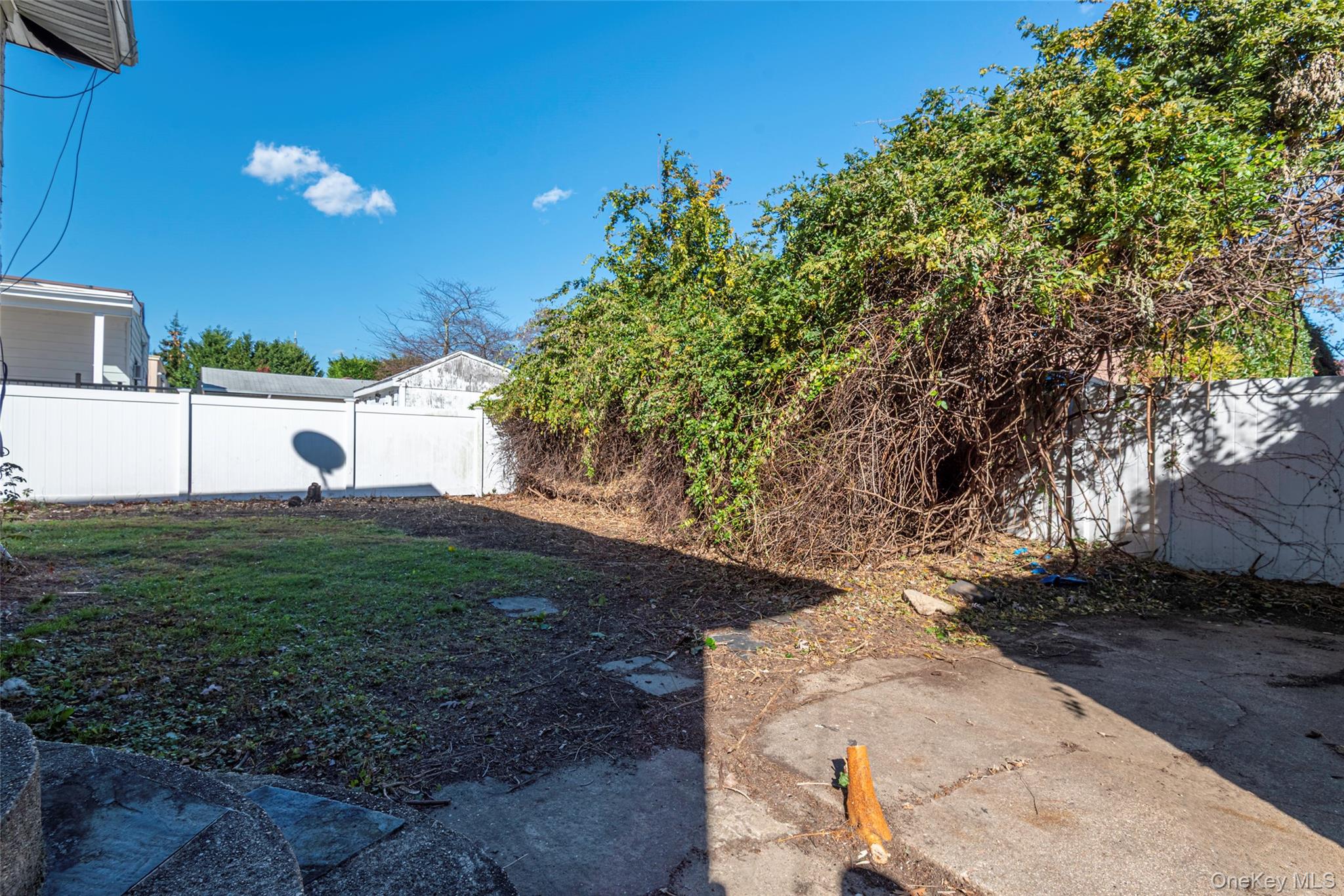 43 Wynsum Avenue Merrick, NY 11566 - Photo 15 of 23 a view of a street with a yard