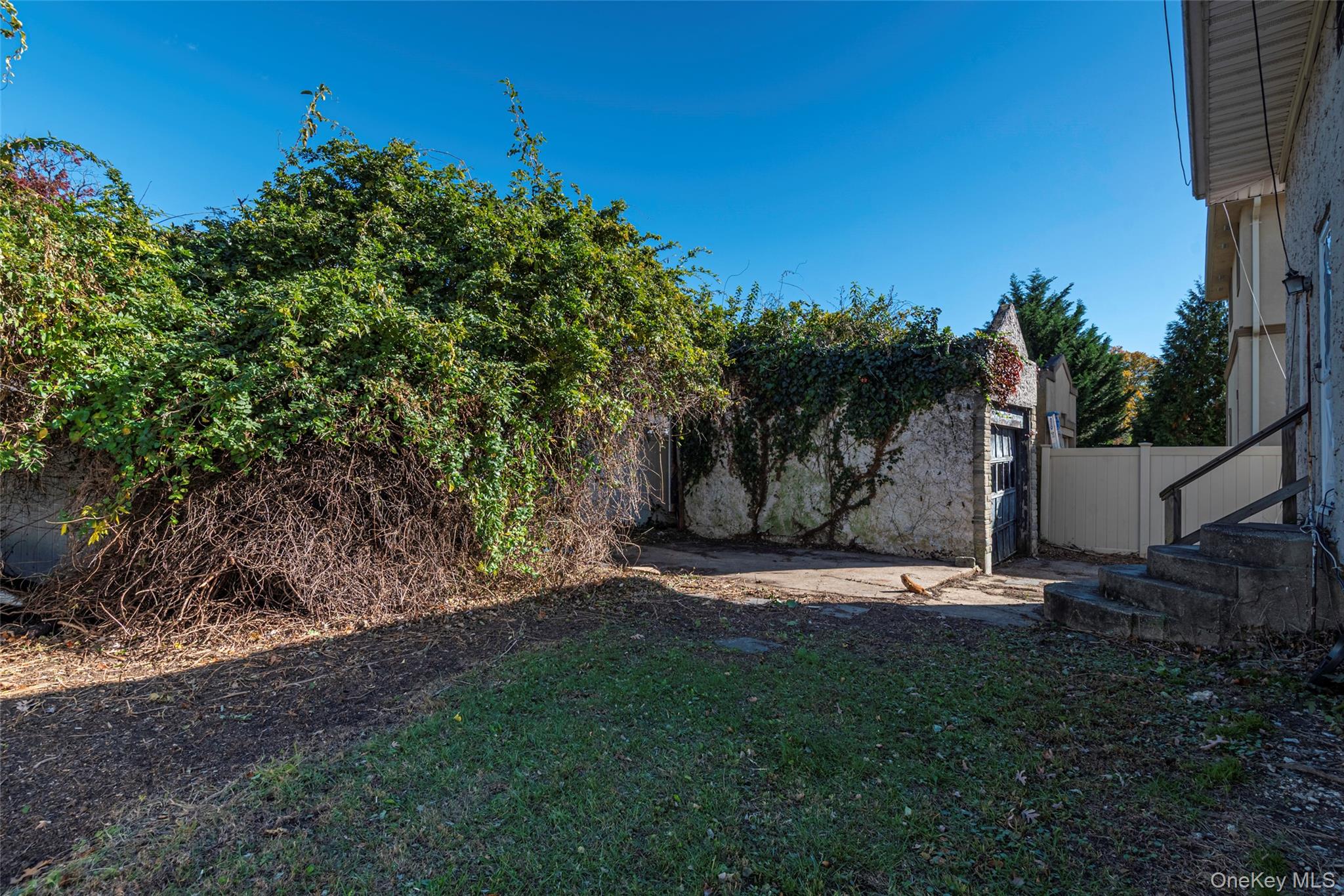 43 Wynsum Avenue Merrick, NY 11566 - Photo 16 of 23 a view of outdoor space with green field and trees