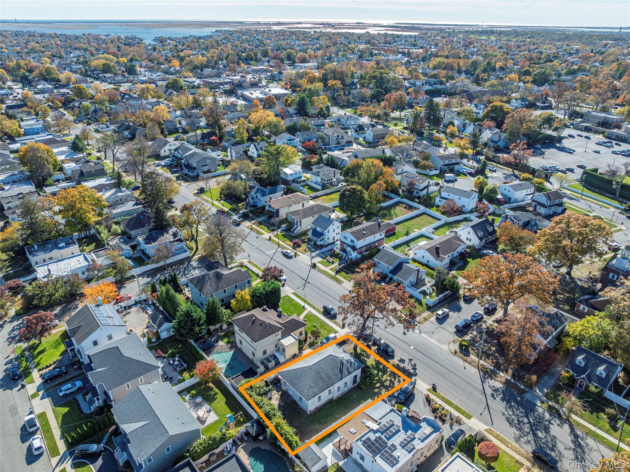 43 Wynsum Avenue Merrick, NY 11566 - Photo 4 of 23 an aerial view of a city with lots of residential buildings