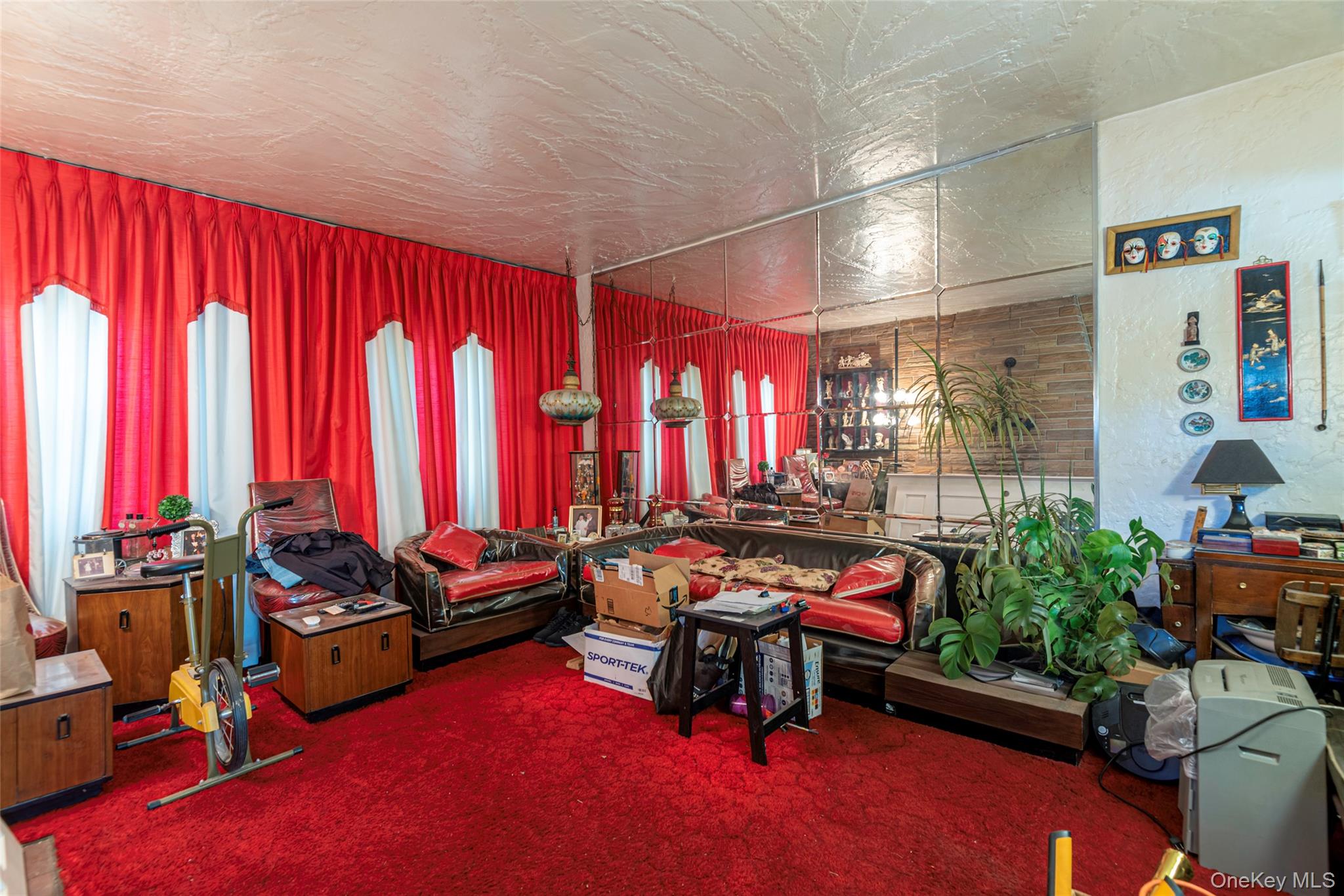 43 Wynsum Avenue Merrick, NY 11566 - Photo 7 of 23 a room with furniture and a large window