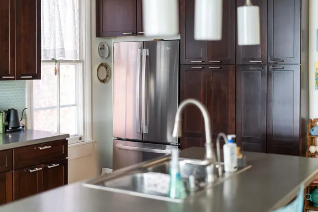 a view of a kitchen with a window