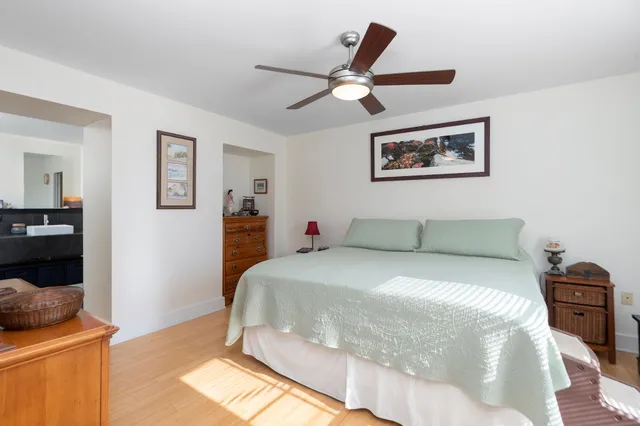 a bed room with a bed and a couch