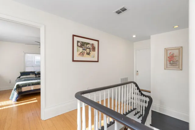 a view of a hallway with workspace
