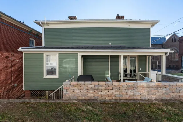 front view of a house with a patio