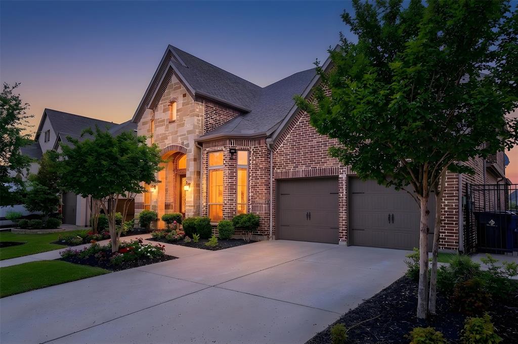 Stone and brick exterior with a prominent arched entry