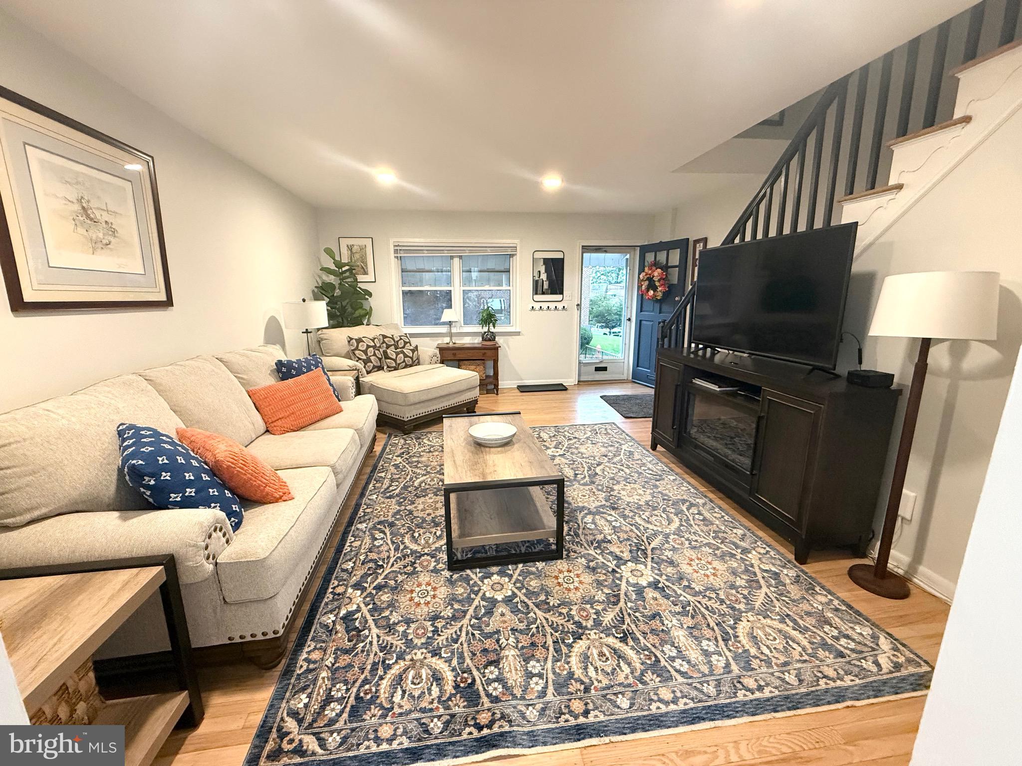 3633 Weightman Street Philadelphia, PA 19129 - Photo 4 of 25 a living room with furniture and a flat screen tv