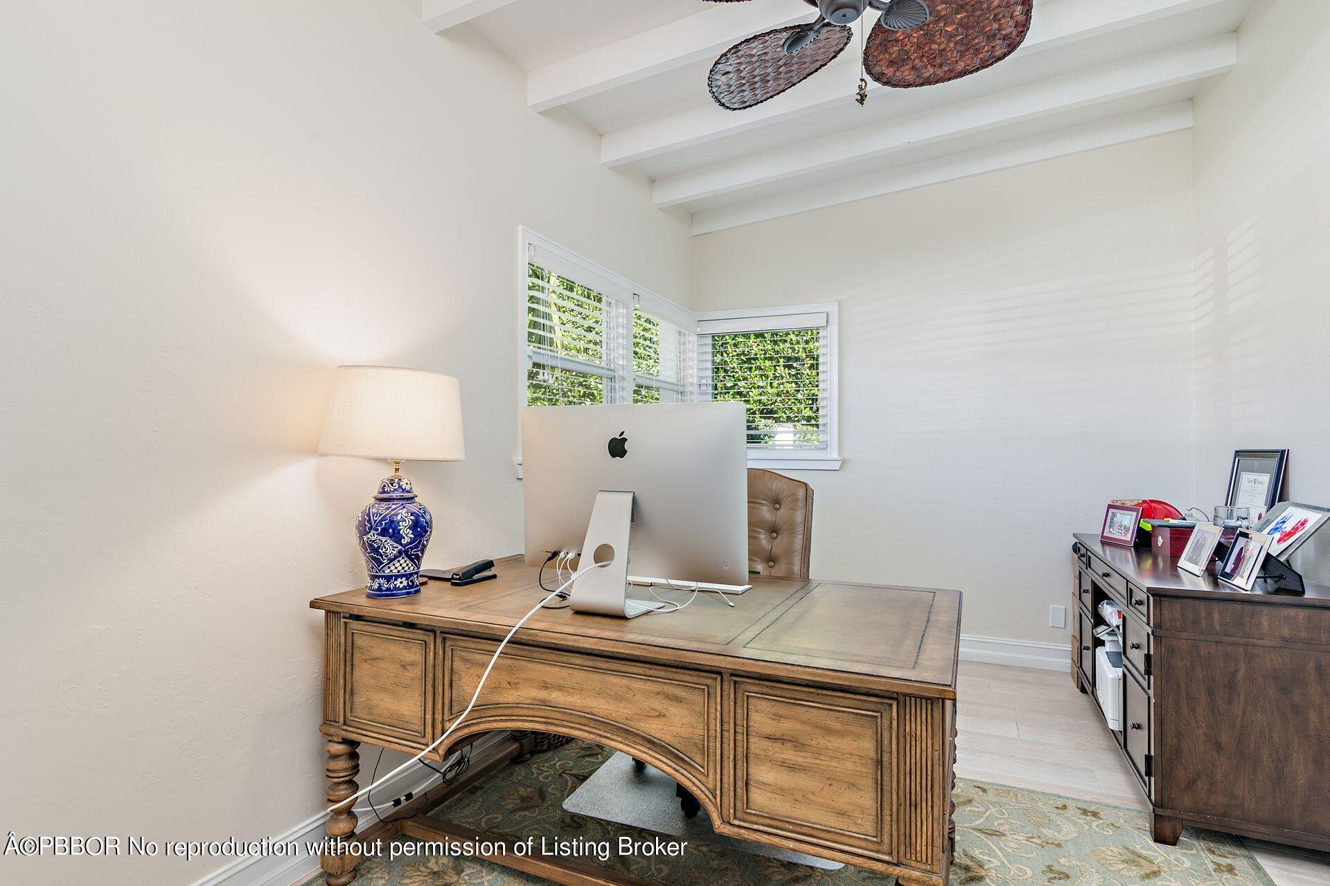 230 Alpine Road West Palm Beach, FL 33405 - Photo 12 of 31 a room with furniture a lamp and a window