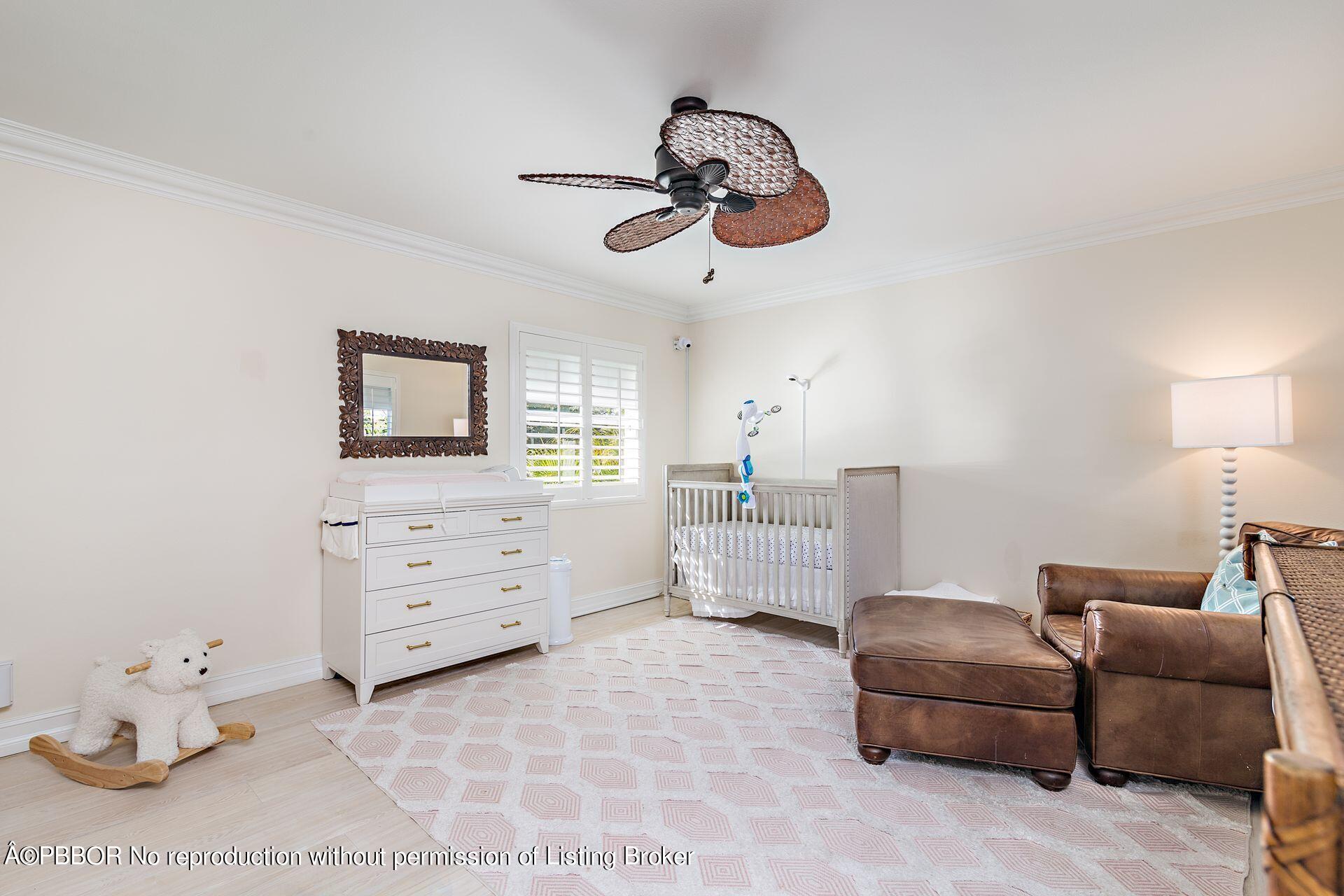 230 Alpine Road West Palm Beach, FL 33405 - Photo 17 of 31 a bedroom with furniture and a window