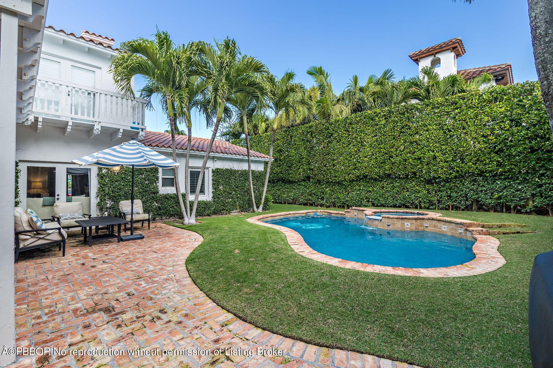 230 Alpine Road West Palm Beach, FL 33405 - Photo 21 of 31 a view of a swimming pool with lounge chair
