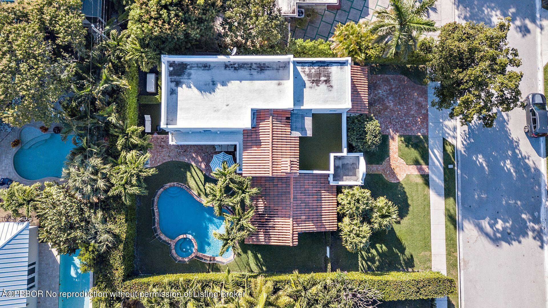 230 Alpine Road West Palm Beach, FL 33405 - Photo 26 of 31 an aerial view of a house with a yard and garden