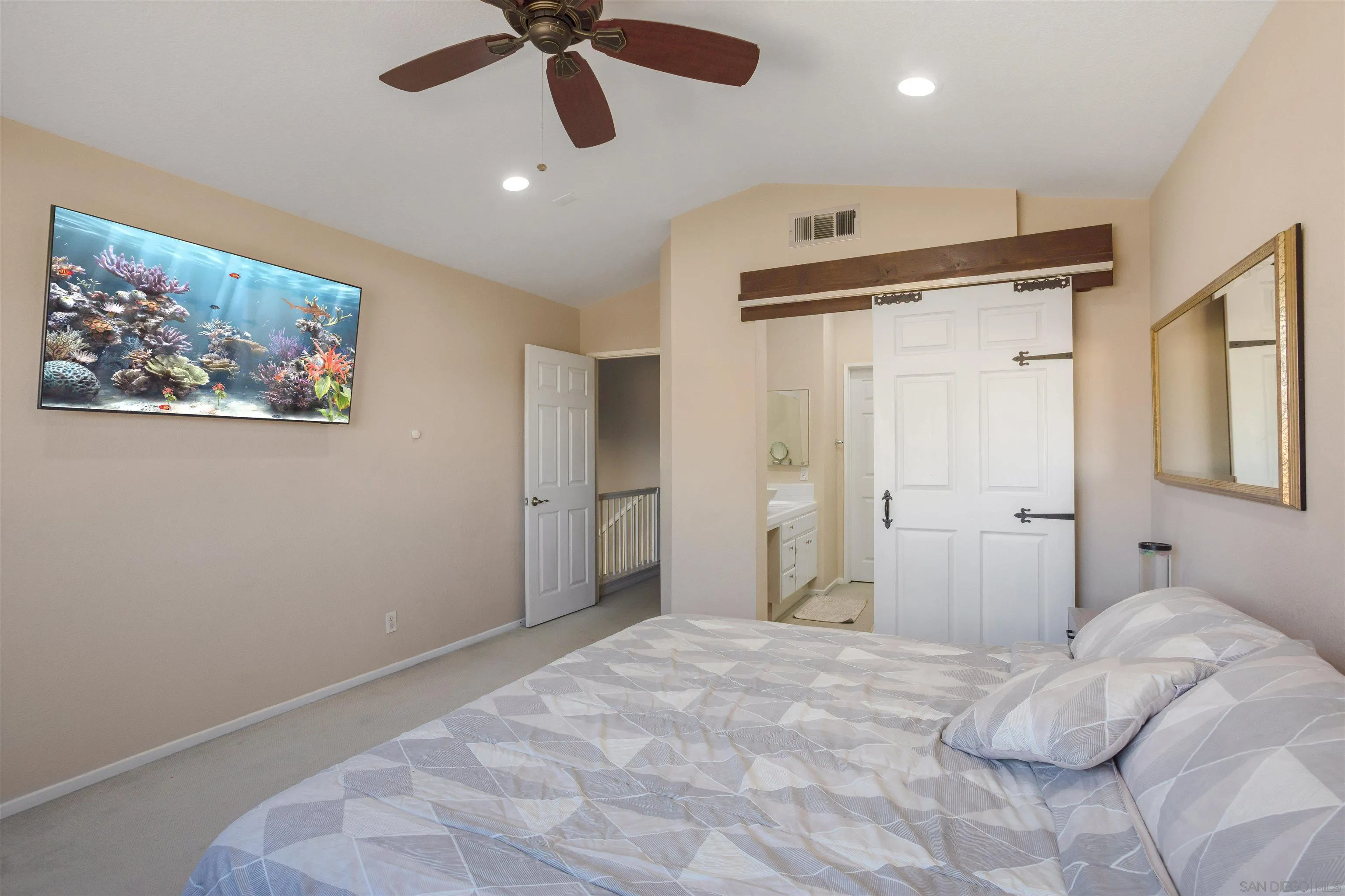32812 Tulley Ranch Road Temecula, CA 92592 - Photo 16 of 35 a bedroom with a bed and a painting on the wall
