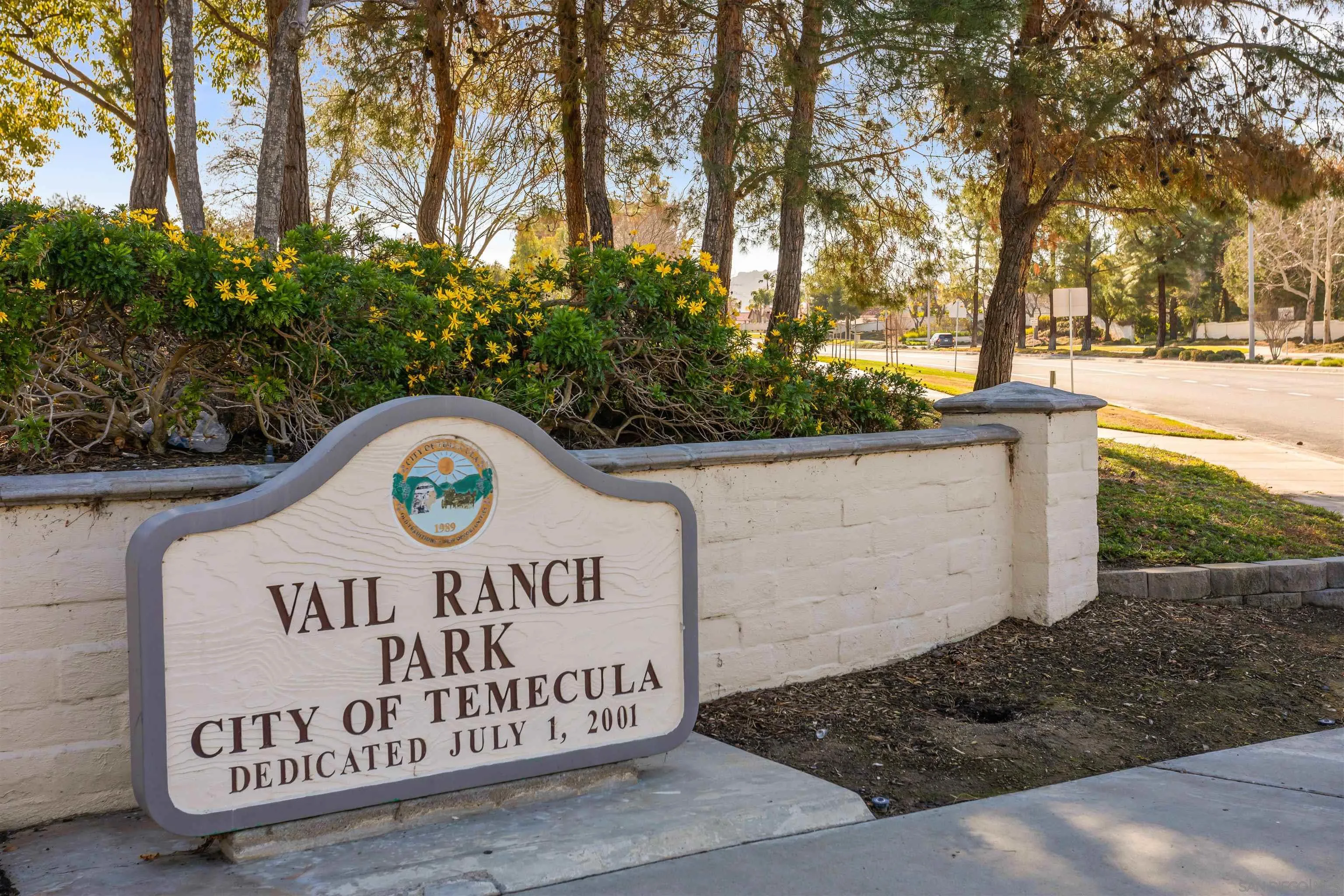 32812 Tulley Ranch Road Temecula, CA 92592 - Photo 28 of 35 a view of outdoor space with signage and flags