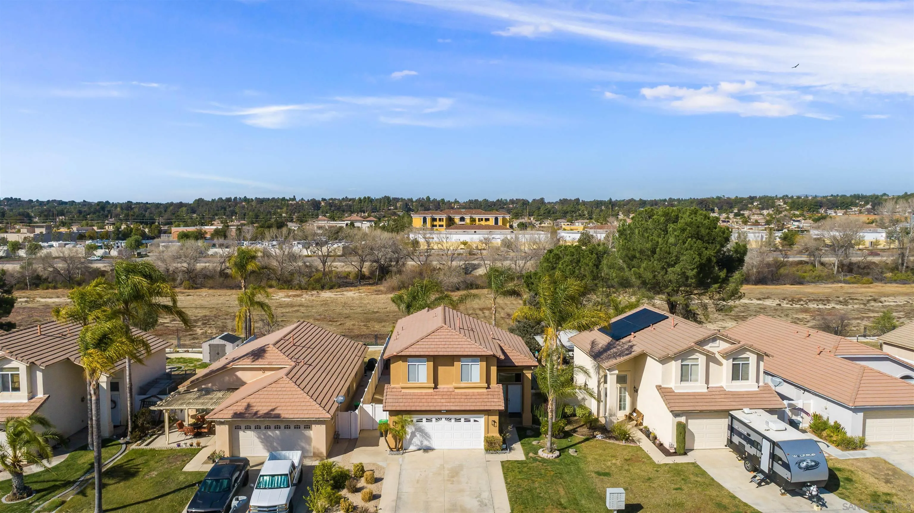 32812 Tulley Ranch Road Temecula, CA 92592 - Photo 34 of 35 an aerial view of residential houses with outdoor space