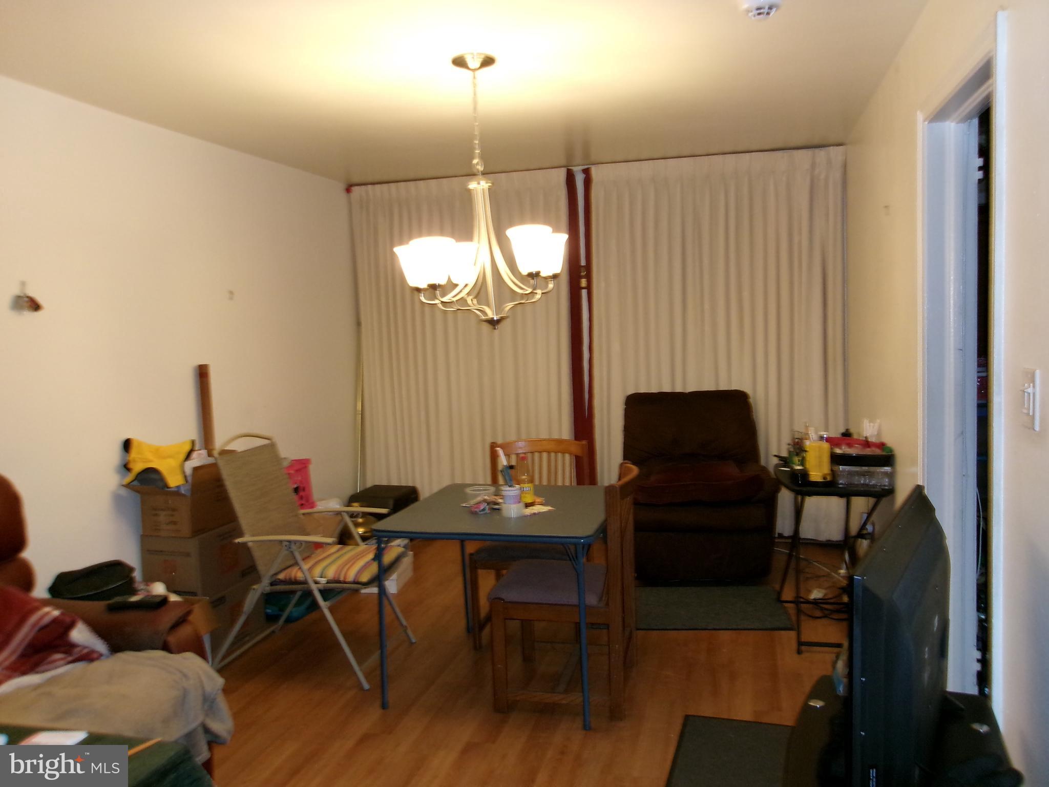 2014 Crestview Road Baltimore, MD 21239 - Photo 4 of 9 a view of a dining room with furniture and wooden floor