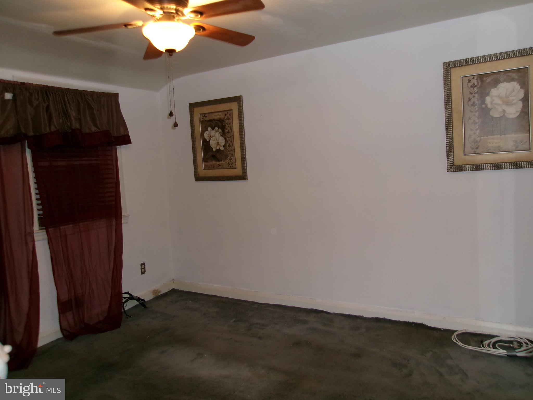 2014 Crestview Road Baltimore, MD 21239 - Photo 6 of 9 a view of an empty room with a fan