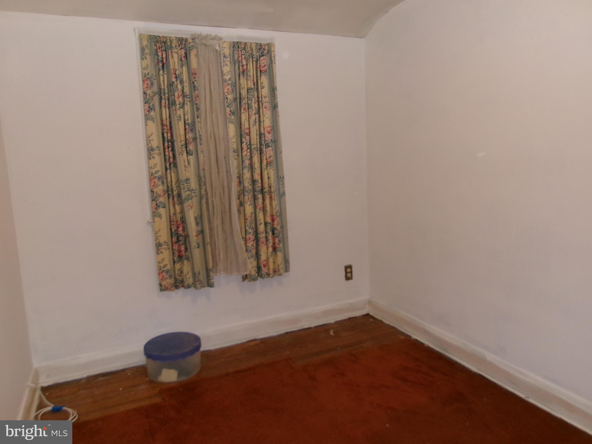 2014 Crestview Road Baltimore, MD 21239 - Photo 8 of 9 a view of a small space with wooden floor and a window