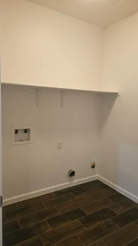 a view of small space with wooden floor