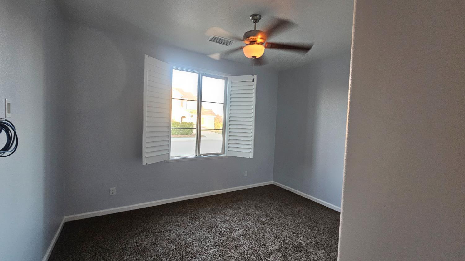 3351 Cordova Avenue Clovis, CA 93619 - Photo 2 of 33 an empty room with windows