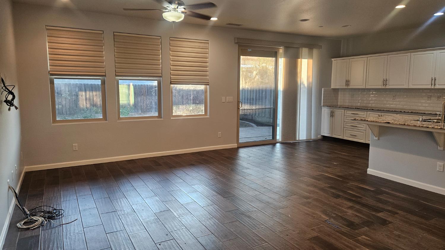 3351 Cordova Avenue Clovis, CA 93619 - Photo 24 of 33 a view of a kitchen with a dishwasher cabinets and a large window